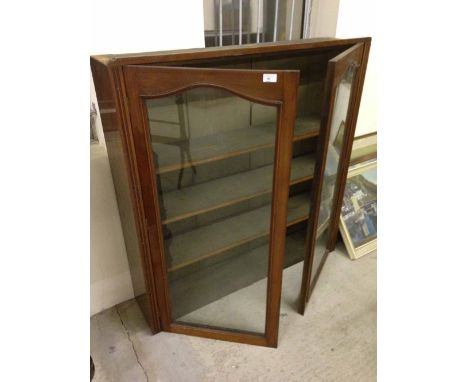 A 3 shelf glass fronted bookcase.