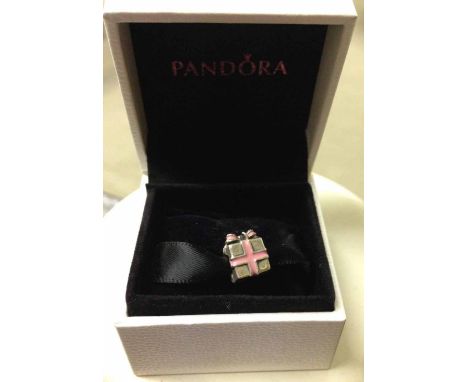 Pandora "All wrapped up in Pandora" charm, sterling silver with pink enamel in original box.