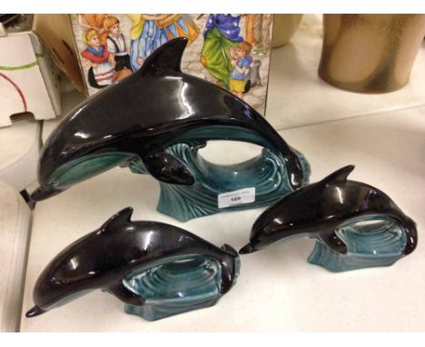 3 Poole Pottery dolphins. 2 sizes.