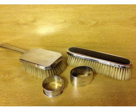 4 hallmarked silver items to include 2 napkin rings, a Mappin & Webb clothes brush - London 1904, and a Mappin & Webb hairbru