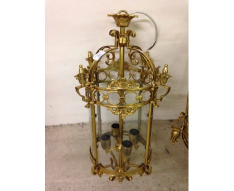 A small brass ceiling lantern.