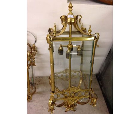 A large brass ceiling lantern.