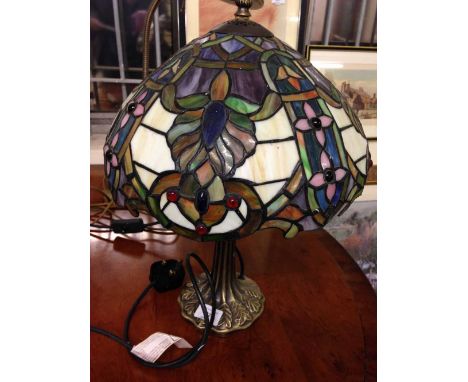 A Tiffany Art Nouveau style lamp.