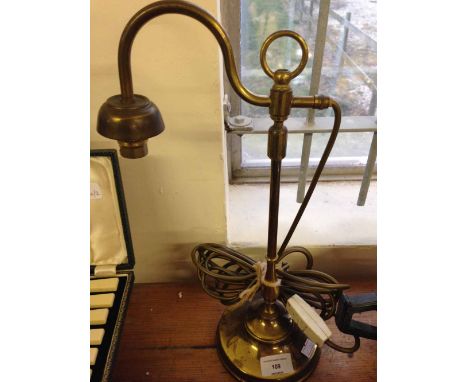 A vintage brass table lamp.