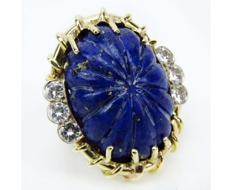 Vintage Approx. 1.20 Carat Round Brilliant Cut Diamond, 14 Karat Yellow Gold and Carved Lapis Lazuli Ring. Diamonds F-G color