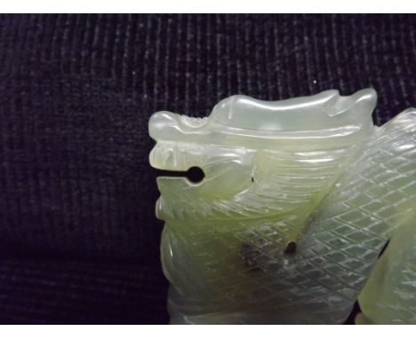 Chinese Jade Hardstone carving of a Dragon. Black inclusion in pale stone. 7cm at longest point. Weight = 68 Grammes.中国玉石龙。浅色