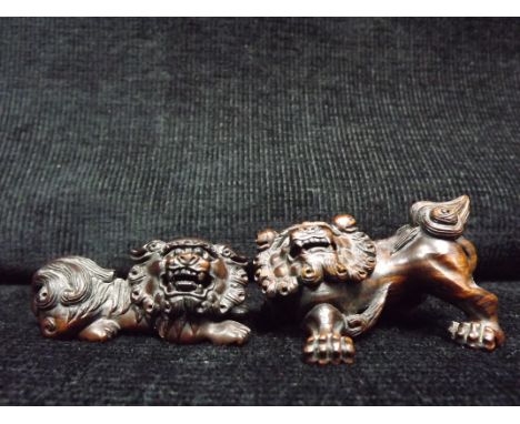 2 x Japanese Netsuke or Miniature Chinese Hardwood Carvings of Foo, Lion or Temple Dogs. Mythical Beasts. Both have inscribed