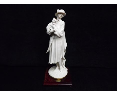 Giuseppe Armani Florence Figurine. Italian Sculture D'Arte. Lady with Terrier Dog (20th Century). Blue 'N' stamp and impresse