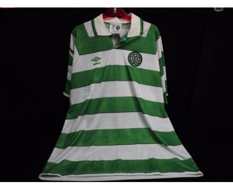 George Best Autograph - The Farm Liverpool - Umbro Replica Celtic Football Club Home Shirt. 1989-1991 Size XL. Used in a vide