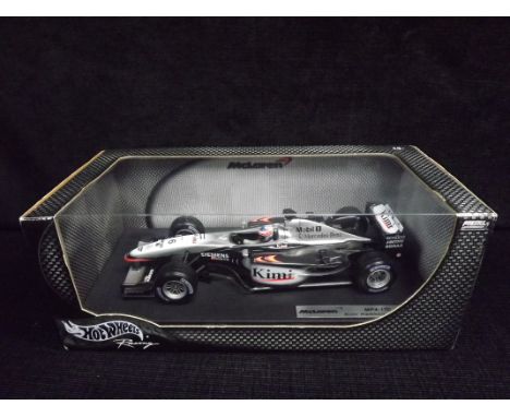 Hot Wheels Racing 1:18 Scale Formula One Car. McLaren MP4-17D 'Kimi Raikkonen' (B1650). Sponsors are Mercedes-Benz, Siemens M