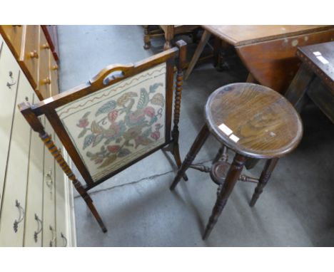An oak barleytwist firescreen and beech kitchen stool 