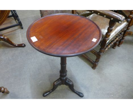 A George III mahogany circular tilt-top tripod table, 69cms h x 39cms d 