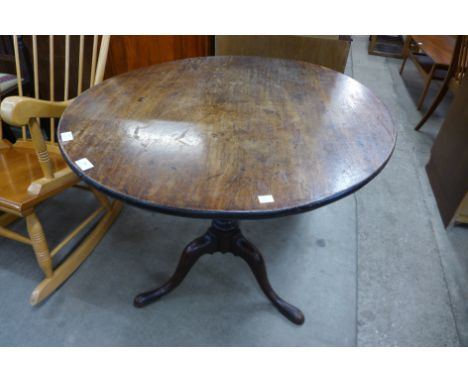 A George III mahogany circular tripod tea table 