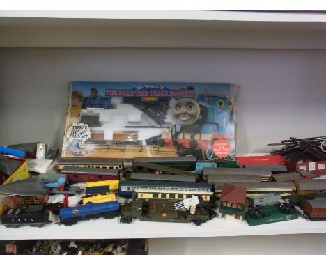 A OO Gauge Railway - Including six locomotives, various composite carriages, buildings, accessories and a Thomas The Tank Eng