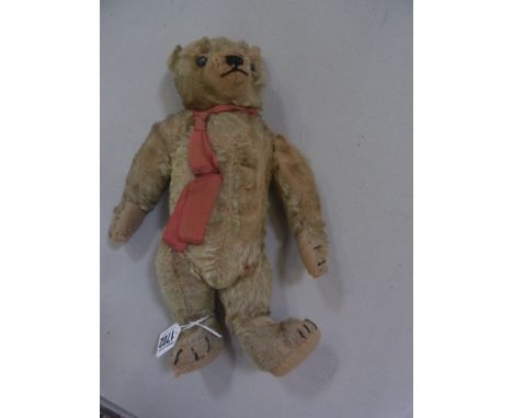 A vintage mohair Teddy Bear with boot button eyes, jointed body and wood wool filling - Height 26cm 
Condition report:  In wo