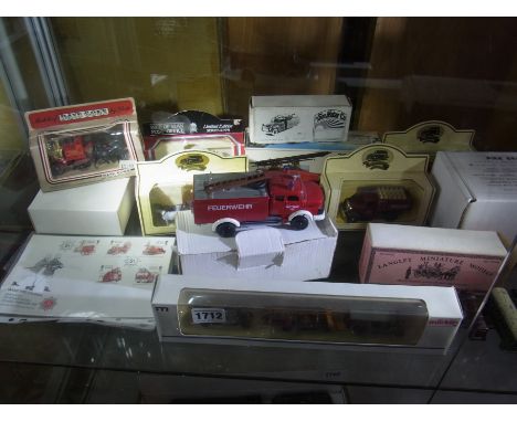 A collection of eleven Diecast models of Fire Engines with a first day cover and assorted Dinky and Marklin carpet trains
Con