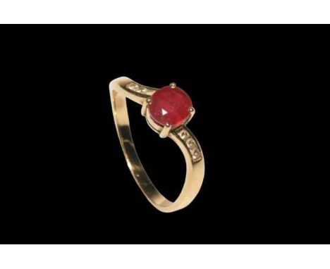 Ruby and diamond 18 carat gold ring, having approximately 0.75 ruby flanked by six brilliants, size P.