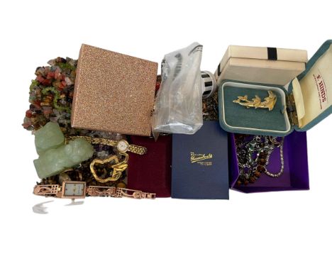 Box of jewellery including gold ring and chain.