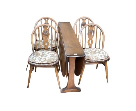 Ercol drop leaf table and set of four Ercol Fleur De Lys dining chairs.