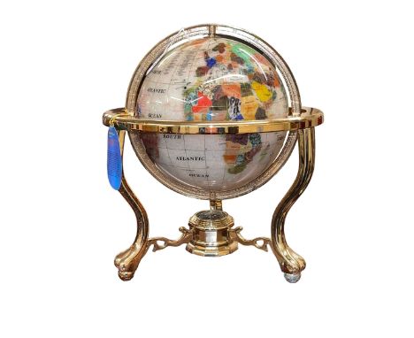 Semi-precious stone and brass bound globe with a compass base, 35cm high.