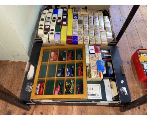 Two boxes of Lledo Days Gone and other model vehicles.
