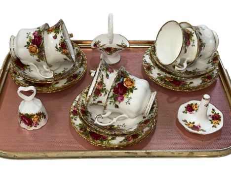 Six Royal Albert Old Country Roses cups and saucers, ring stand, bell and basket.