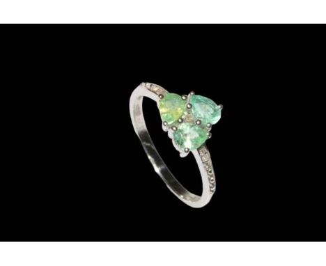 Paraiba Tourmaline and diamond limited edition 9 carat gold ring, size N/O, with certificate.