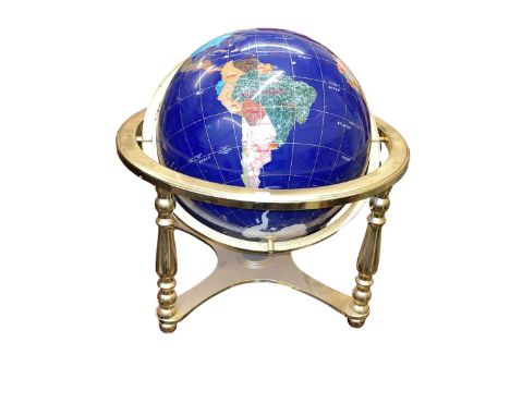 Semi-precious stone and brass bound globe with a compass base, 41cm high.