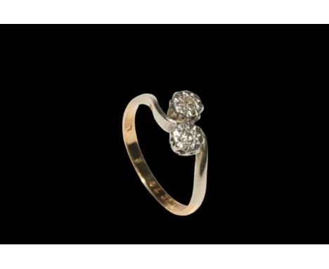 Diamond two stone 18 carat gold and platinum ring, size K.