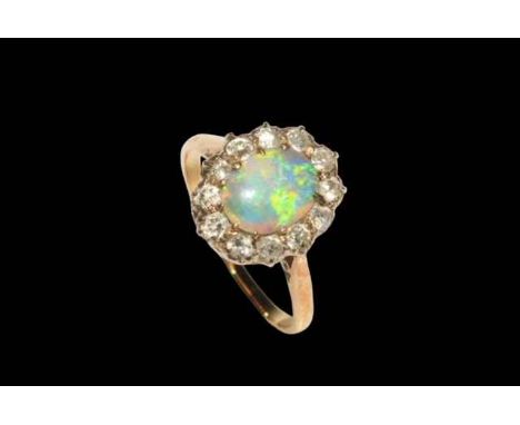 Opal and diamond cluster ring, size O.