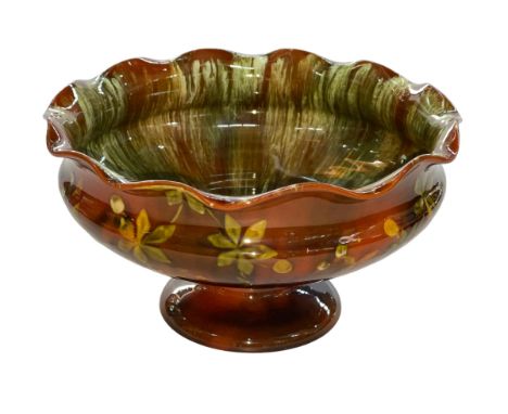 Linthorpe Pottery pedestal bowl with foliate decoration, number 1072, 22cm diameter.