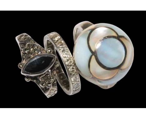 Diamond set eternity ring and two silver rings (3).