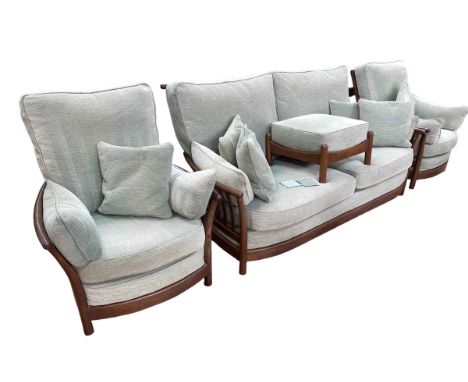 Ercol Renaissance three piece lounge suite and footstool in green fabric.