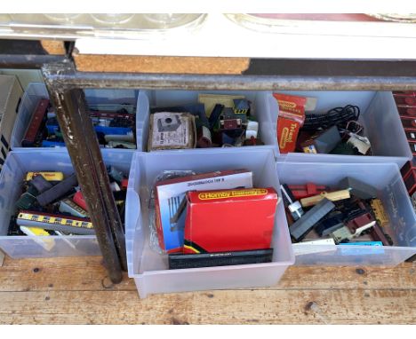 Six boxes of model railway engines, rolling stock and accessories.
