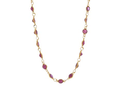 A 14ct gold ruby line necklace, designed as a series of circular-shape rubies, with S hook clasp, length 46cm, 4.9gCondition-