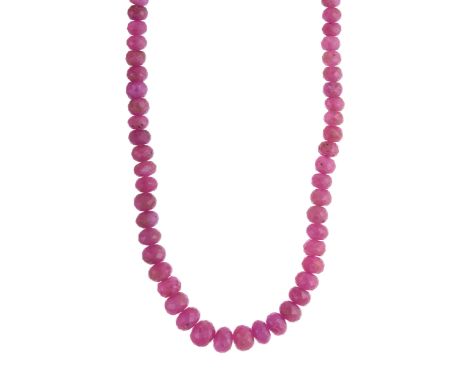 A graduated ruby bead necklace, with 9ct gold magnetic clasp, stamped 375, length 46.5cmCondition- Overall good condition- Ru