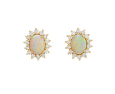 A pair of 18ct gold opal cabochon and brilliant-cut diamond cluster stud earrings, estimated total diamond weight 0.70ct, I-J