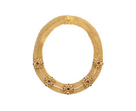 Ilias Lalaounis, an 18ct gold ruby cabochon and sapphire two-row collar necklace, with partially concealed push-piece clasp, 