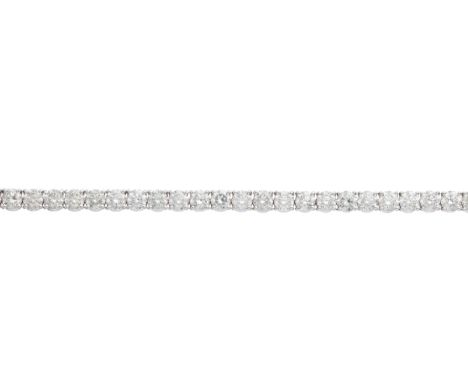 An 18ct white gold brilliant-cut diamond line bracelet, with partially concealed push-piece clasp, estimated total diamond we