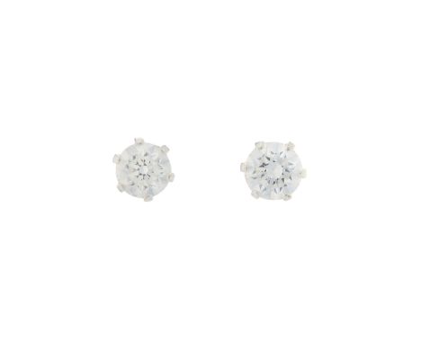 A pair of brilliant-cut diamond single-stone stud earrings, with two IGI reports, stating 0.32ct, F colour, SI2 clarity and 0