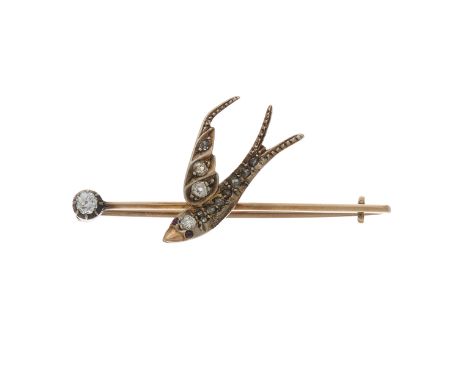 An early 20th century gold and silver, vari-cut diamond swallow brooch, with ruby cabochon eyes, one wing deficient, estimate