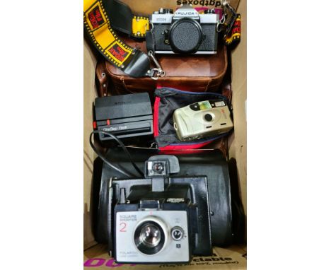 A lot of mixed cameras and accessories to include a Fujica STX-1 camera, a vintage Polaroid Square Shooter 2 camera, a Polaro