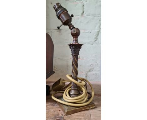 A vintage adjustable brass table lamp, height 34cm.  