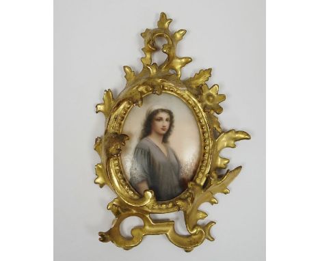 Continental porcelain oval plaque in giltwood frame, late 19th century, incised 'LS' mark, painted in Berlin-style with a por