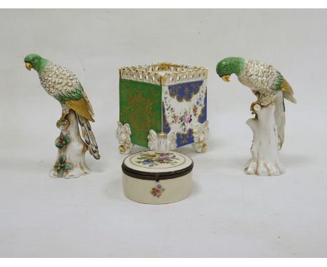 French porcelain square section jardiniere, circa 1835, painted with swags of flowers alternating between blue and green bord