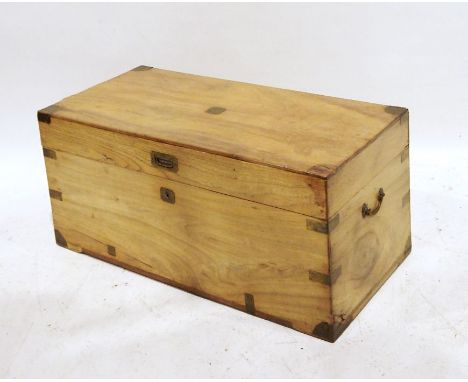 Campaign-style travel trunk with brass escutcheon and recessed handle, brass loop handles to the sidesCondition ReportScratch