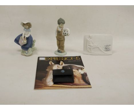 Nao figure of a boy with a football&nbsp;and a Lladro figure of Pretty Pickings&nbsp;No.05222, 15cm high, together with a Lla