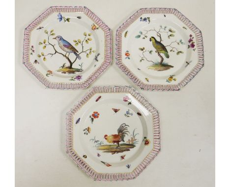 Three Meissen style plates, 19th century, spurious blue cross sword marks, painted in the Meissen Marcolini style with vignet