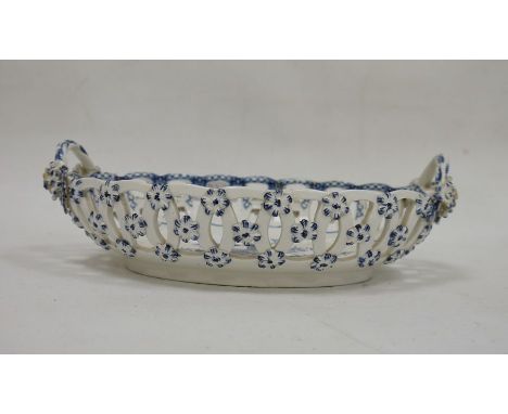 Caughley Worcester-style two-handled oviform basket printed 'CB3' mark, printed with the pinecone pattern in blue, with ropet
