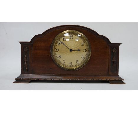 Modern mantel clock in mahogany casing, Arabic numerals to the dial, the mechanism marked 'Buren Swiss Made'